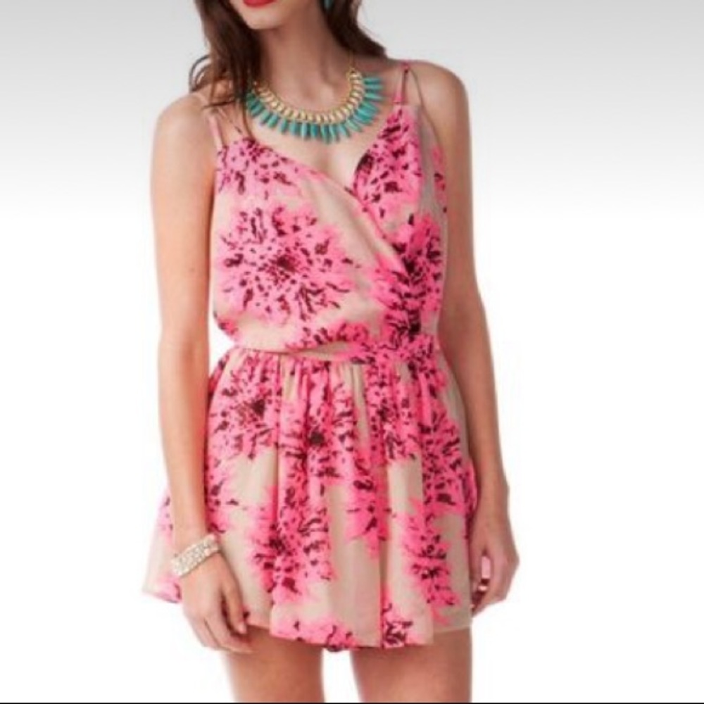 Jun & Ivy tan and pink floral open back romper. Size large